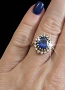 Złoty pierścionek .markiza szafirowe oczko