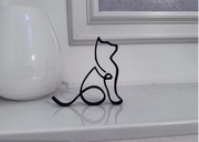 Dekoracja w stylu minimalistycznym line art  siedzący kot