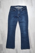 Spodnie jeansowe Levi's jeansy dzwony straight M