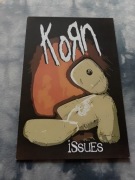 plakat zespołu muzycznego korn