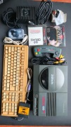 Amiga CD32, pad, mysz, klawiatura, dwie gry oryginalne