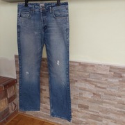 Spodnie jeansowe z przetarciami 38/34