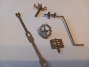 Wychwyt, koło wychwytu, zawieszka wahadła, wieszak, wiatraczek 