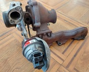 Turbosprężarka Garrett M12 Opel Insignia kolektor wydechowy