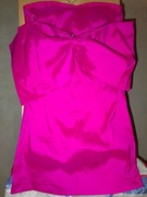 Pretty little thing: fuksjowa mini sukienka z kokardą na plecach 42