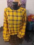 Żółta bluzka w kratkę z bufiastymi rękawami