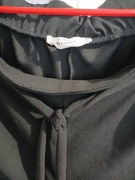 Czarne spodnie z kieszeniami Reserved XL