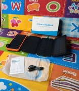 Powerbank solarny 4 panelowy skórzany nowy 3A