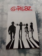 plakat zespołu muzycznego gorillaz