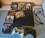 Konsola PS3 320GB (CECH-2504B) + 3 pady i 7 gier