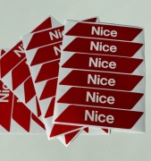 Nalepki ostrzegawcze na ramię szlabanu Nice WA10 24 sztuki