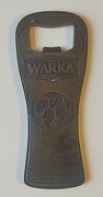Metalowy otwieracz do butelek kapsli piwa WARKA kształt zarys szklanki.
