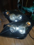 Lampy przednie Opel Astra H