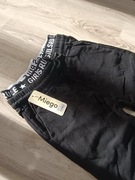 Nowe bojówki ocieplane guma w pasie z napisem S/M