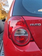 CHEVROLET AVEO T255 HB 08-11 LAMPA TYLNA LEWA EU ORYGINAŁ BDB