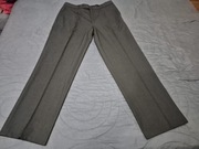 Eleganckie czarne spodnie garniturowe.80% wełna! Bogate wykończenie!