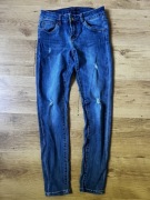 Niebieskie jeansy z rozdarciami Toxik3, rozmiar M/38