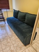 Rozkładana zielona kanapa retro, loft
