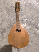 Mandolina i 1000 złotych z wizerunkiem Kopernika 