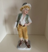 Figurka stojąca chłopiec z książką manufaktura arpo