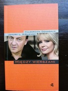 Między wierszami - Małgorzata Domagalik, Janusz Leon Wiśniewski