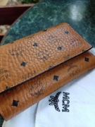 Portfel damski skórzany marki premium MCM.