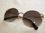 Damskie okulary przeciwsłoneczne Miu Miu – SMU 52T