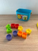 Pierwsze klocki malucha Sorter wiaderko różne kształty Fisher Price