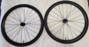 Koła 28" Bontrager Paradigm SL Centerlock Disc komplet + plus opony,mleko