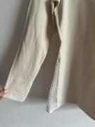Kremowy longsleeve / bluzka z siatką po bokach