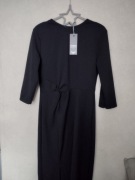 Długa czarna sukienka z rozcięciem na prawej nodze rozm m opis