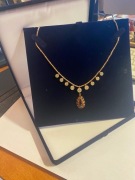 Naszyjnik z diamentami ( szlif brylant ) i  granatami , 14 kt  złoto .