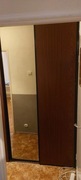 Szafa przesuwna z lustrem. Wysoka.