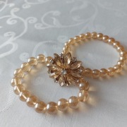 Pierścionek regulowany z cyrkoniami – kwiat 3 cm ,i bransoletki na gumce 