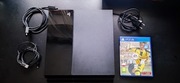 PlayStation 4 z padem i grą FIFA17 