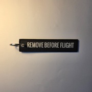 Haft REMOVE BEFORE FLIGHT brelok