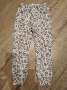Spodnie w kwiatuszki dresy NEWBIE jak nowe 122