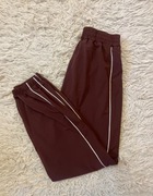 Brązowe spodnie ala dresowe nylonowe