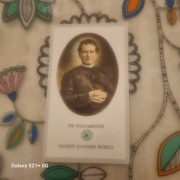 Obrazek-relikwia św.Jan Bosko jak na zdjęciu.