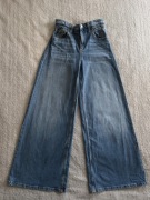 Niebieskie szerokie przecierane bawełniane spodnie jeansowe jeansy H&M 152