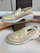 Beżowe skórzane mokasyny z odkrytą Pięta