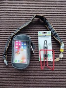 Zestaw akcesoriów rowerowych. Łanćuch, uchwyt na bidon, mala sakwa.