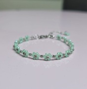 Pleciona bransoletka kwiatki miętowa 