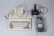 Commodore AMIGA 600,zasilacz,joystick i 30 dyskietek w retro pudełku