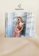 Kremowa/ Ecru broszka z piór indyka