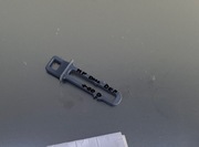 Zaczep zamek drzwi zmywarka Hotpoint Ariston