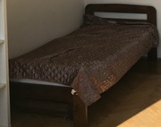 łóżko drewniane z materacem i szufladą