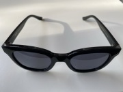 Oryginalne damskie czarne okulary przeciwsłoneczne Meller MAHÉ 51 24 145