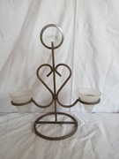 Stary metalowy świecznik