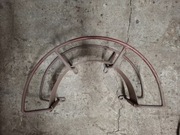 Uchwyt scienny do węża ogrodowego lub pneumatycznego.